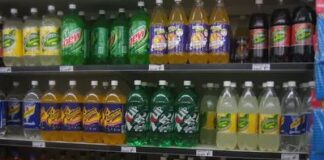 How did soft drinks develop from medicated water into a global product?